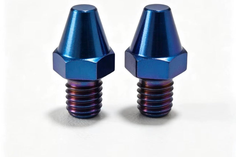 Titanium peg stoppers
